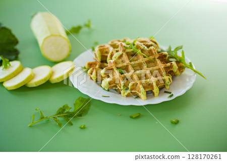 Healthy dish - zucchini and greens waffles 128170261
