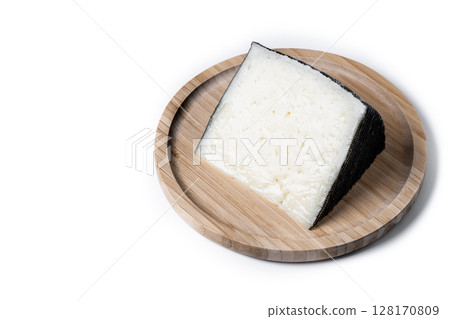 Close-up of a wedge of semi-cured cow's cheese Close-up of a wedge of semi-cured cow's cheese 128170809