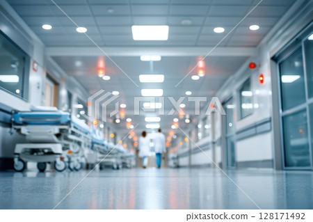 A modern hospital corridor featuring medical staff, advanced equipment, and essential services 128171492