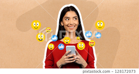 A young Middle Eastern woman in a red top smiles while using her smartphone. She appears engaged in conversation, surrounded by cheerful emojis, reflecting her enjoyment of social media interactions. A young Middle Eastern woman in a red top smiles while using her smartphone. She appears engaged in conversation, surrounded by cheerful emojis, reflecting her enjoyment of social media interactions. 128172073