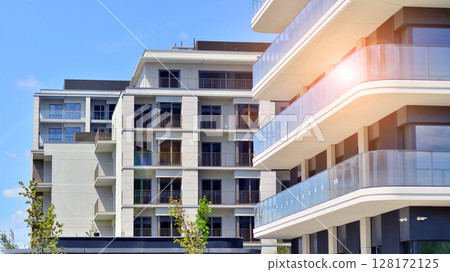 Downtown modern residential architecture. Architectural details of modern apartment building. Modern european residential apartment building complex. Downtown modern residential architecture. Architectural details of modern apartment building. Modern european residential apartment building complex. 128172125