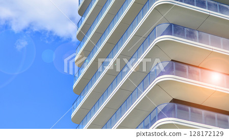 Downtown modern residential architecture. Architectural details of modern apartment building. Modern european residential apartment building complex. Downtown modern residential architecture. Architectural details of modern apartment building. Modern european residential apartment building complex. 128172129
