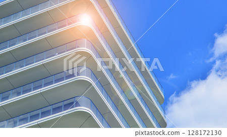 Downtown modern residential architecture. Architectural details of modern apartment building. Modern european residential apartment building complex. Downtown modern residential architecture. Architectural details of modern apartment building. Modern european residential apartment building complex. 128172130