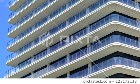 Downtown modern residential architecture. Architectural details of modern apartment building. Modern european residential apartment building complex. 128172138