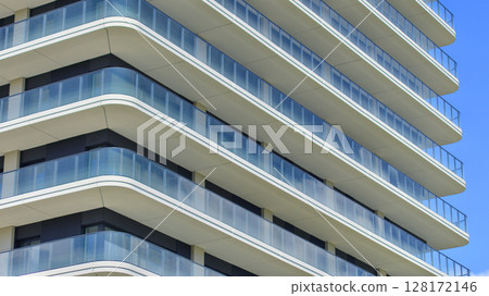 Downtown modern residential architecture. Architectural details of modern apartment building. Modern european residential apartment building complex. 128172146