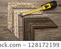 Frame and measuring tool samples on grey boards 128172199