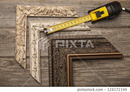 Frame and measuring tool samples on grey boards Frame and measuring tool samples on grey boards 128172199