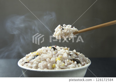 Steaming hot, freshly cooked rice with grains Steaming hot, freshly cooked rice with grains 128172584