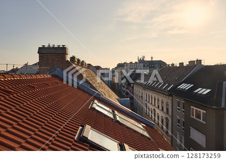 Tiled Building Roofs Over a City Street Tiled Building Roofs Over a City Street 128173259