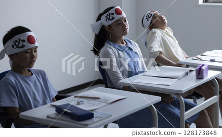 Elementary school students studying for exams 128173848