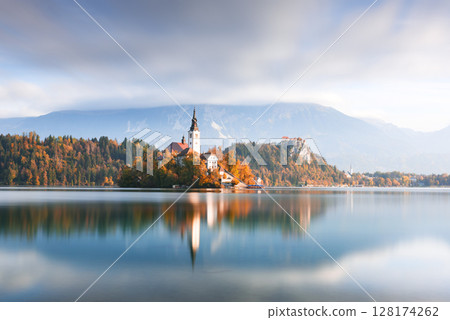 Vibrant autumn landscape of Lake Bled in Julian Alps Vibrant autumn landscape of Lake Bled in Julian Alps 128174262