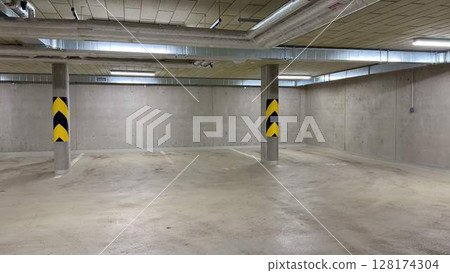 Modern Underground Parking Garage Design and Functionality for Urban Development 128174304