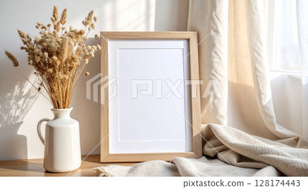 Natural background with linen photo frame and dried flowers Natural background with linen photo frame and dried flowers 128174443