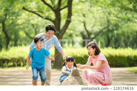 Japanese family playing in the park Japanese family playing in the park 128174616