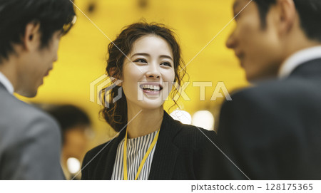 A team of men and women having a meeting in the office Business scene A team of men and women having a meeting in the office Business scene 128175365