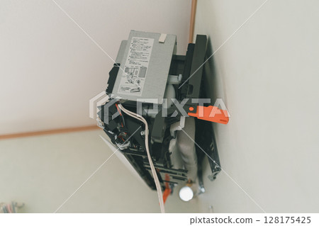 Air conditioning installation work Air conditioning installation work 128175425