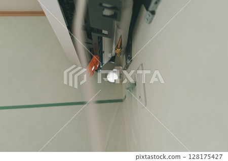 Air conditioning installation work Air conditioning installation work 128175427