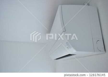 white air conditioner on wall, electricity object in home white air conditioner on wall, electricity object in home 128176145