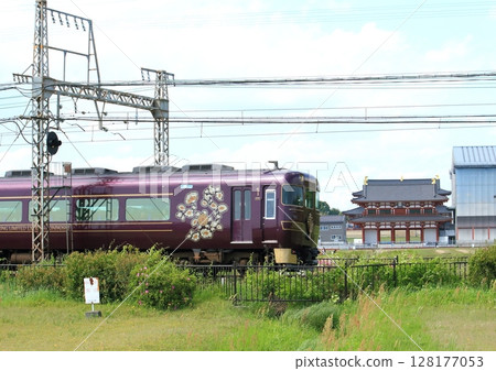 Kintetsu's sightseeing limited express "Ayoyoshi" that runs inside the site of the world heritage Nara Heijo Palace 128177053