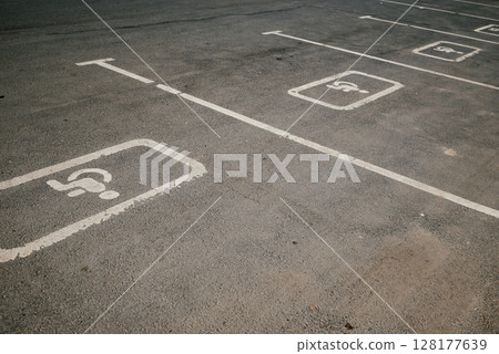 Empty Parking Spaces with Disabled Markings Visible 128177639
