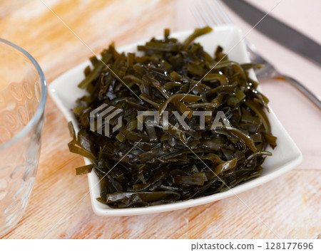 Sea kale salad served on platter 128177696