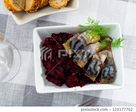Pieces of scomber with beetroot served on plate Pieces of scomber with beetroot served on plate 128177702