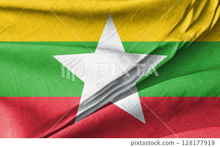 Burmese Flag Creased Close-Up Symbolizing Myanmar Heritage and National Pride 128177919