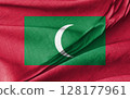 Flag of Maldives with Crescent and Star on Waving Fabric Texture 128177961