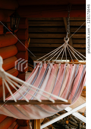 Cozy Hammock on Rustic Wooden Porch 128178646