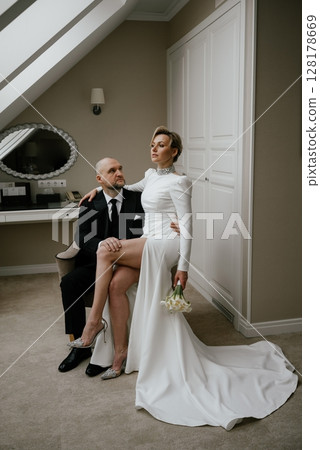 Elegant Bridal Moment in Sophisticated Interior 128178669