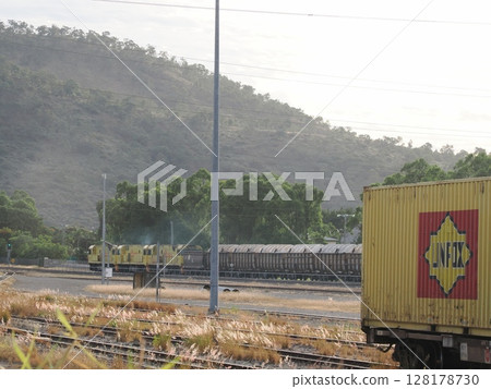 Yellow on the Tracks - Stuart Afternoon, LINFOX and Locomotive Scene Yellow on the Tracks - Stuart Afternoon, LINFOX and Locomotive Scene 128178730