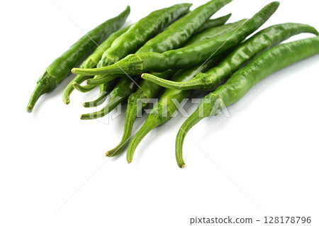 Green chili peppers (white background, copy space available) 128178796