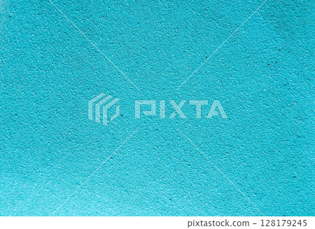 Bright turquoise textured surface, perfect for use as a background in design projects, presentations, templates, posters, or digital graphics with copy space. 128179245
