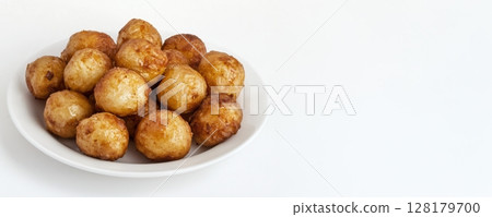 Enjoy the Deliciously Golden Fried Snack Balls, Perfect for Any Occasion or Gathering 128179700