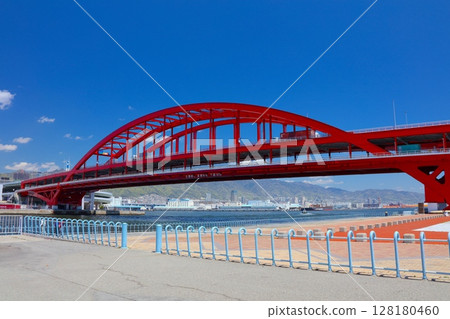 Kobe Bridge, Kobe Port and the fresh greenery of Mount Rokko (from Port Island North Park) 128180460