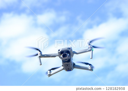 Aerial equipment Drone with Digital Camera on the mountain background.Technology concept Aerial equipment Drone with Digital Camera on the mountain background.Technology concept 128182938