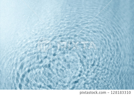 Blue water texture background. Clean transparent water surface with rings and ripples. Summer concept. Flat lay Blue water texture background. Clean transparent water surface with rings and ripples. Summer concept. Flat lay 128183310