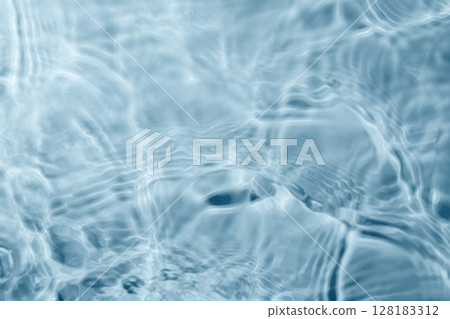 Blue water texture background. Clean transparent water surface with ripples. Summer concept. Flat lay Blue water texture background. Clean transparent water surface with ripples. Summer concept. Flat lay 128183312