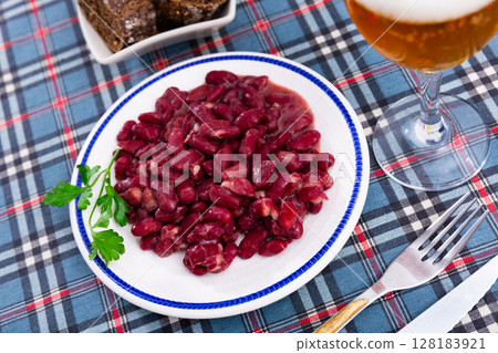 Delicious red beans with green parsley on dinner table 128183921