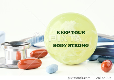 THE CONCEPT PHRASE IS KEEP YOUR BODY STRONG. Fitness, workout, healthy lifestyle. 128185006