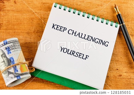 Personal growth concept. Words KEEP CHALLENGING YOURSELF Personal growth concept. Words KEEP CHALLENGING YOURSELF 128185031