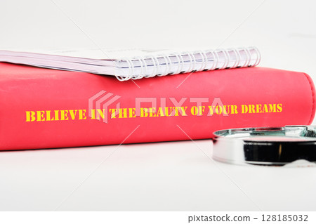 Business and Believe in your Dreams concept. Copy space. Concept words BELIEVE IN THE BEAUTY OF YOUR DREAMS 128185032