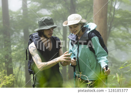 Trekking tourists Trekking tourists 128185377