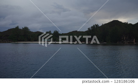 Night shot from a boat of Seychelles Island Curieuse Night shot from a boat of Seychelles Island Curieuse 128186106