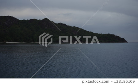 Night shot from a boat of Seychelles Island Curieuse Night shot from a boat of Seychelles Island Curieuse 128186109
