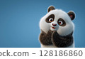 Playful panda with bright eyes and fluffy fur on a smooth blue background 128186860