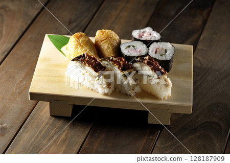 Grilled mackerel, seaweed rolls, inari sushi Grilled mackerel, seaweed rolls, inari sushi 128187909
