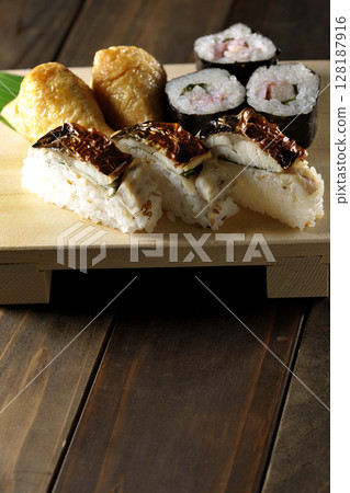 Grilled mackerel, seaweed rolls, inari sushi 128187916