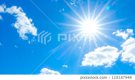 Blue sky and sparkling sun 128187946