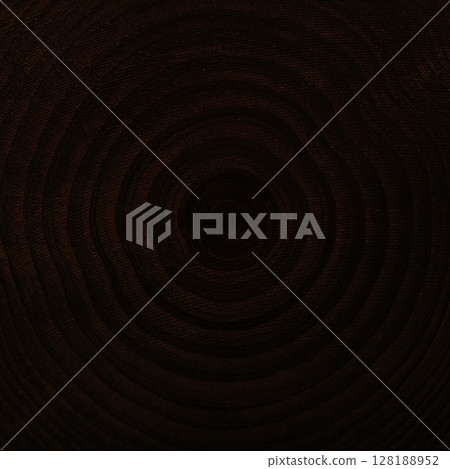 A square background image of a board with fine grained black and brown wood grain showing annual rings 128188952